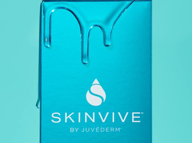 SKINVIVE by Juvederm box with clear hyaluronic acid gel dripping over the top, on a turquoise background